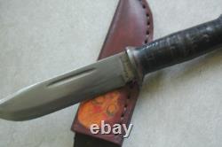 Cattaraugus 225Q knife. Hand-sewn and decorated leather sheath