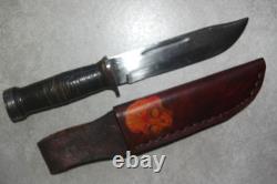 Cattaraugus 225Q knife. Hand-sewn and decorated leather sheath