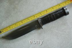 Cattaraugus 225Q knife. Hand-sewn and decorated leather sheath