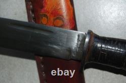 Cattaraugus 225Q knife. Hand-sewn and decorated leather sheath