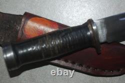 Cattaraugus 225Q knife. Hand-sewn and decorated leather sheath