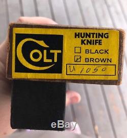 Colt hunting knife U1050, wood handle, with original box, and holder