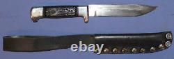 Hunting knife with leather sheath