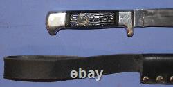 Hunting knife with leather sheath