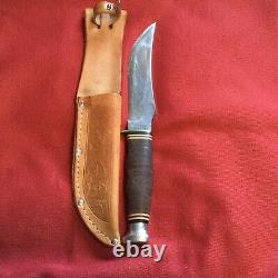 KA-BAR Knife with sheath. Sheath has deer engraved. Knife 9 1/4 blade 5