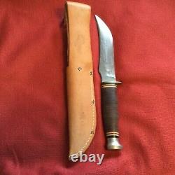 KA-BAR Knife with sheath. Sheath has deer engraved. Knife 9 1/4 blade 5