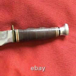 KA-BAR Knife with sheath. Sheath has deer engraved. Knife 9 1/4 blade 5