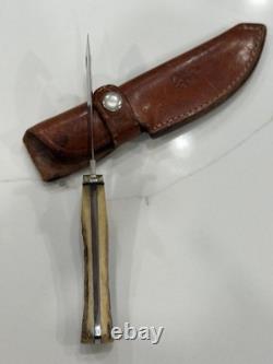 Vintage Browning #519 fixed blade gut-hook knife. Stag handles made in Japan