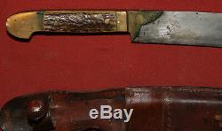 Vintage hand made hunting knife with leather sheath