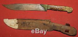 Vintage hand made hunting knife with leather sheath